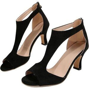 Women's black open toe mid heel sandals with zipper closure and cut out design.